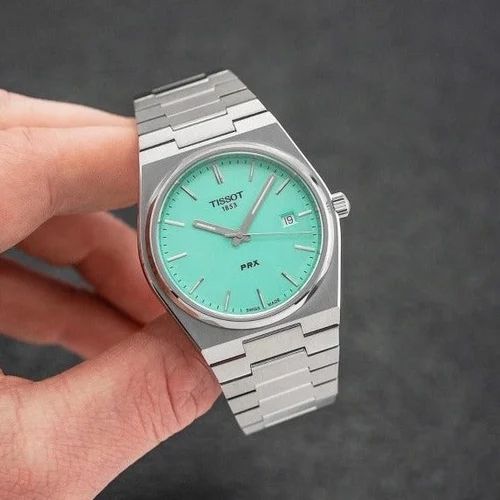 The TISSOT PRX High end quality japanese battery operated machine